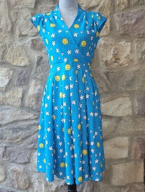 Lady Vintage London Eva dress in happy sun and clouds print